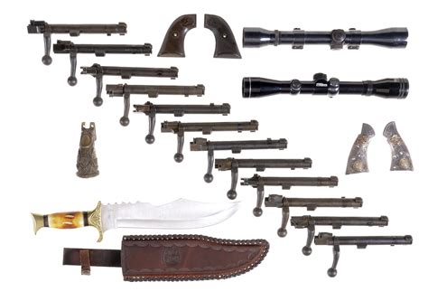 Group Of Assorted Firearm Parts And One Bowie Knife Rock Island Auction