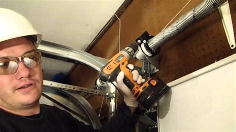 Installing A Garage Door Part 4 Tensioning The Ez Set Torsion Spring Youtube