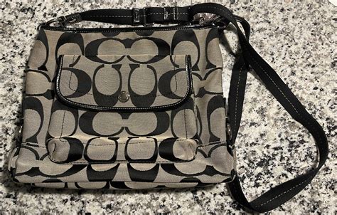 Coach Black Canvas Kyra Daisy Purse Gem