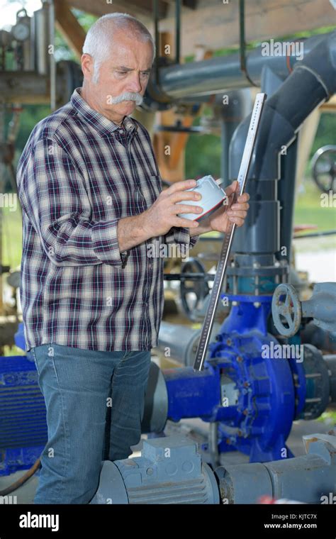 engineer inspecting  object stock photo alamy