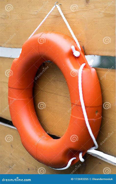 Buoy Or Lifebuoy Ring On Shipboard In Wooden Background Flotation