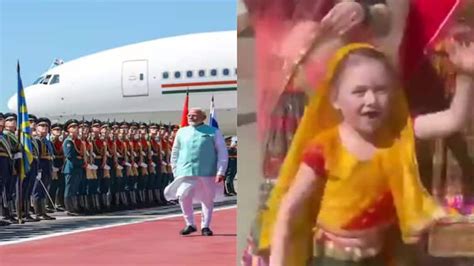 Pm Modi At Russia Welcomed By A Young Russian Girl Dressed In Indian