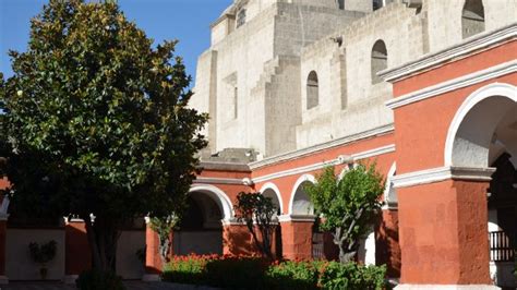 A monastery surrounded by three volcanoes