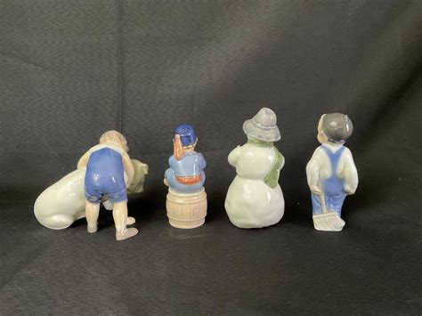 Lot - Seven Royal Copenhagen Figurines