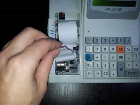 Как вставить ленту в кассовый аппарат