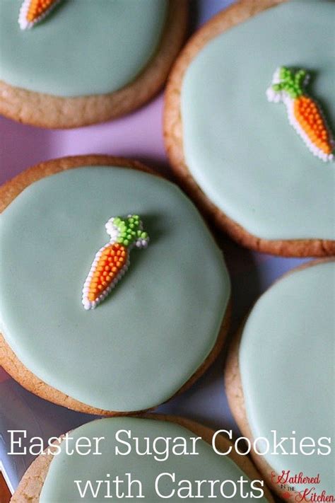 Easter Sugar Cookies With Carrot Decorations Gathered In The Kitchen