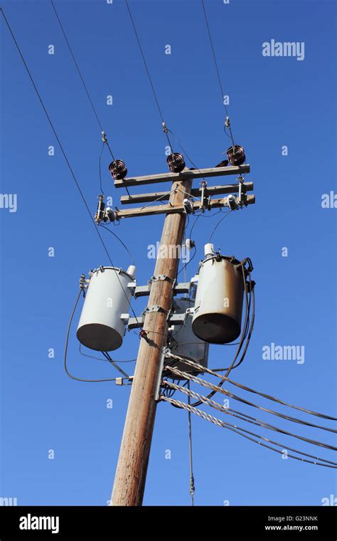 A Distribution Transformer Mounted On A Utility Pole Stock Photo Alamy