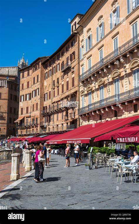 Outdoor Cafes Surrounding Piazza Del Campo In Siena Tuscany Italy