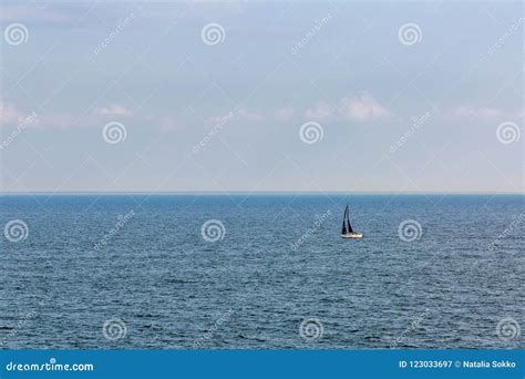 A Sailboat with a Black Sail Stock Image - Image of outdoors, summer ...