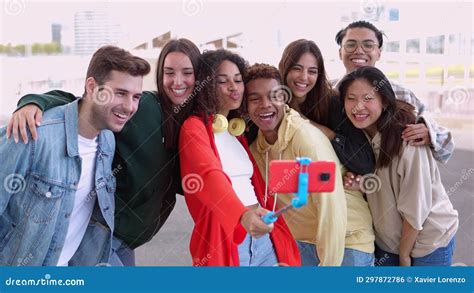 Happy Young Group Of Multiracial Friends Taking Self Portrait With