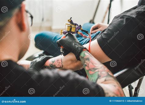 Tattoo Machine Make Drawing On Male Hand Stock Image Image Of