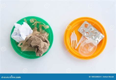 Colorful Plastic Garbage Plates Plastic Waste On One Plate And Paper