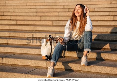 Smiling Brunette Woman Autumn Clothes Sitting Stock Photo 718139965
