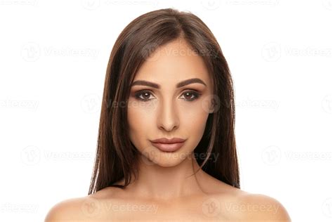 Close Up Portrait Of A Brunette Nude Model Girl With Professional Evening Make Up And Plump Lips