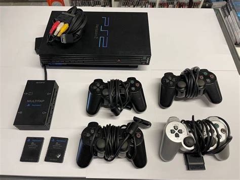 1 Sony Playstation 2 With 4 Controllers And Multi Tab Catawiki