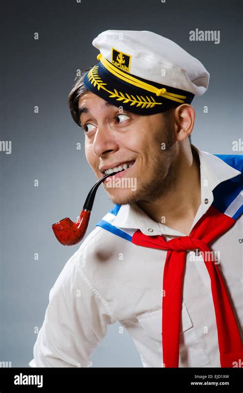 Funny captain sailor wearing hat Stock Photo - Alamy