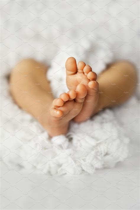 Closeup Of Newborn Legs