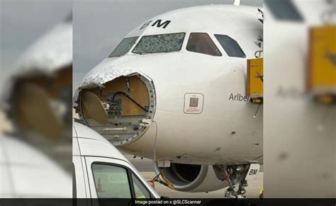 Hailstorm Damages Nose Cockpit Windows Of Austrian Airline Plane