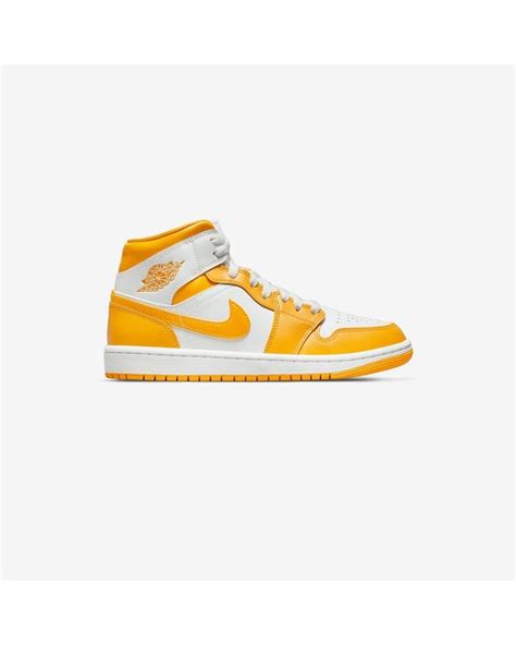 Nike Air Jordan 1 Mid in Yellow | Lyst