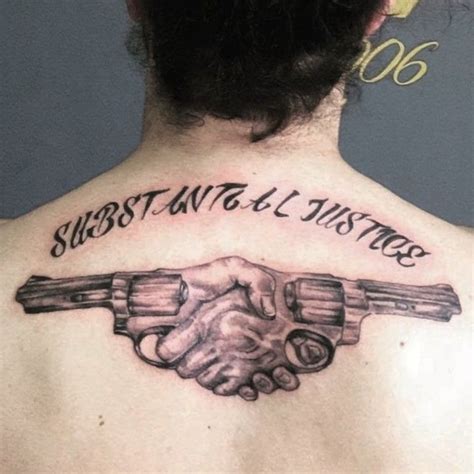 Gun Tattoo On Back Of Hand