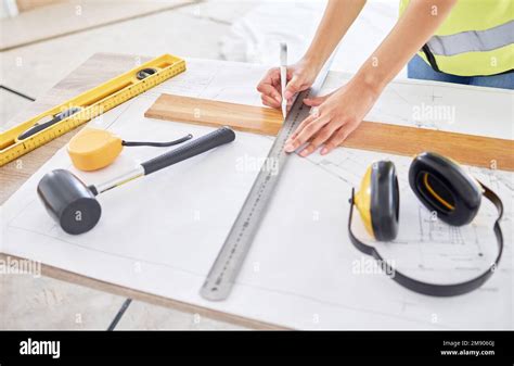 Adding A Homely Touch An Unrecognisable Contractor Standing Alone