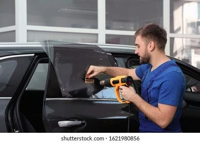 Worker Tinting Car Window Heat Gun Stock Photo Shutterstock