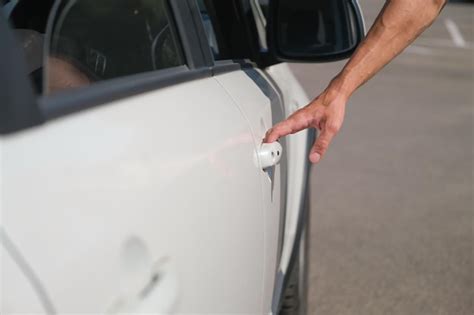 Premium Photo Man Holding Car Door Handle And Opening Car Door