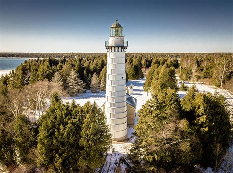 Cana Island Lighthouse Photograph by Randy Scherkenbach - Pixels