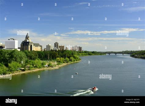 Saskatoon city skyline and the South Saskatchewan river that runs ...