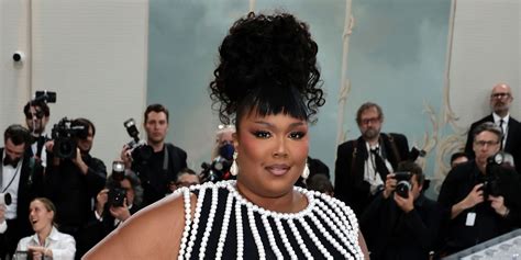 Lizzo Shut Down the 2023 Met Gala Red Carpet in a Pearl-Draped Gown