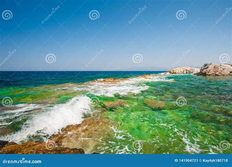 Azure Sea Stones At The Shore Vacation Near The Sea Stock Image