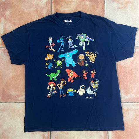 Disney Pixar character T shirt Navy blue... - Depop