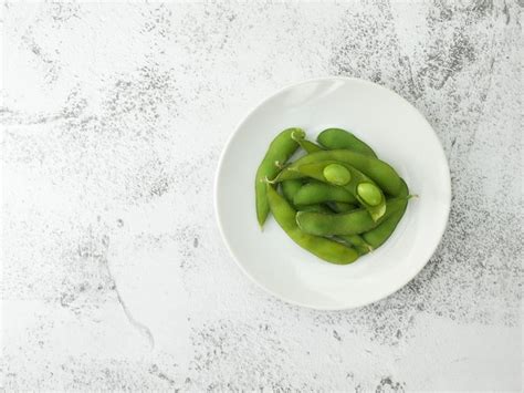 Premium Photo Edamame Beans In Dish On Stone Texture Background Green