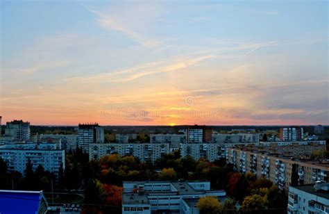 A Panoramic View of the Sunset Sky Over the City Rooftops. Stock Image ...