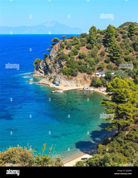 Aegean Sea Coast Landscape With Aquamarine Water And Mount Athos In