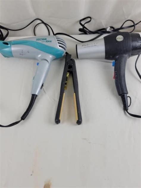 2 Blow Dryers And Flat Iron Live And Online Auctions On