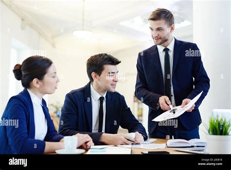 Discussion Of Financial Data Stock Photo Alamy