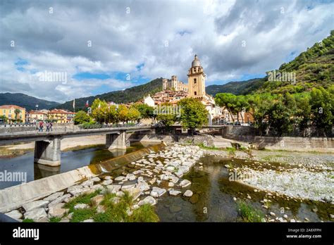 View across the Nevia River of the Saint Anthony Church tower and the medieval Castle ...