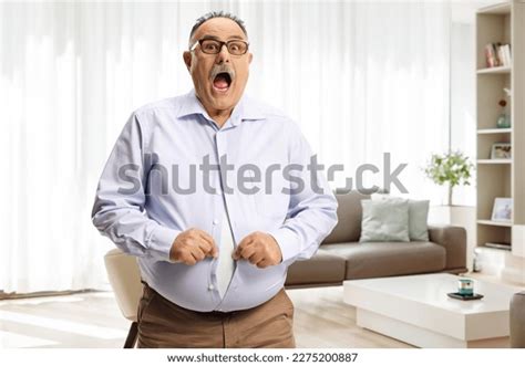 Shocked Mature Man Big Belly Trying Stock Photo 2275200887 Shutterstock