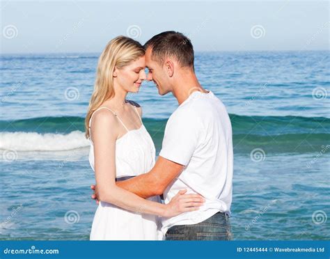 Intimate Lovers Embracing At The Beach Stock Images Image 12445444