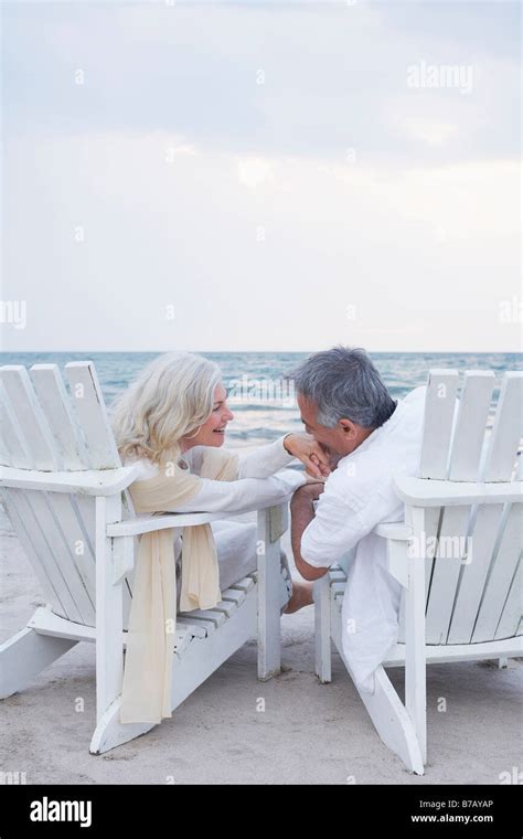 Mature Couple Sitting In Deck Chairs Hi Res Stock Photography And Images Alamy