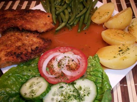 Putenschnitzel In Knuspriger Kartoffelchips Panade Mit Prinzessbohnen