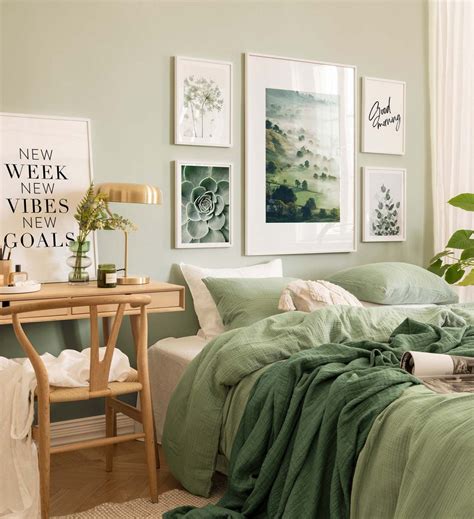 Green and soft gallery wall with white wood frames for bedroom