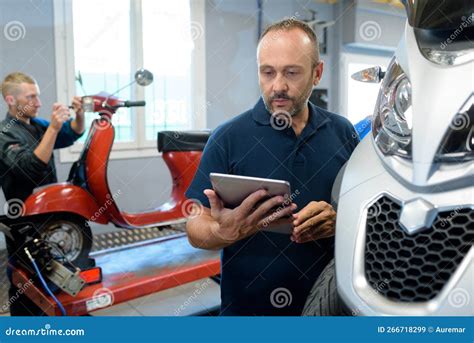 Scooter Senior Mechanic Checking Details Stock Image Image Of Drift