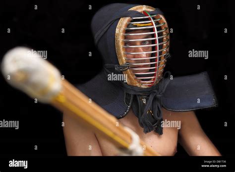 kendo man with helmet over black background Stock Photo - Alamy