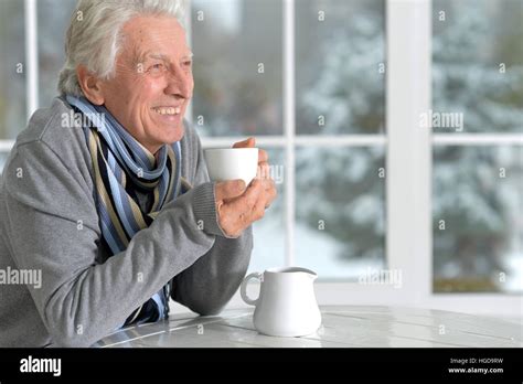 Mature Man Drinking Coffee Stock Photo Alamy