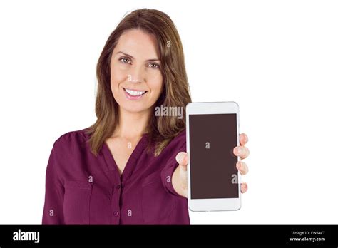 Pretty Brunette Showing Smartphone Stock Photo Alamy