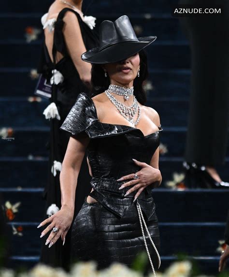 Kim Kardashian Sexy Shows Off Her Sizzling Curves And Cleavage In A Hot Skintight Leather Dress