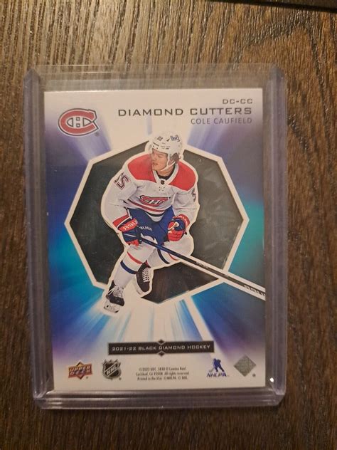 2021 22 Upper Deck Black Diamond Cole Caufield Diamond Cutters Rookie