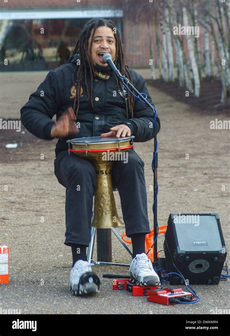 busker playing drum in London Stock Photo - Alamy